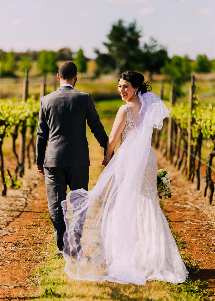 A bride and groom at a winery wedding at Witchmount Estate