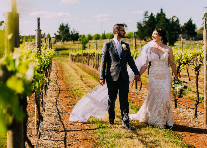 A bride and groom at a winery wedding at Witchmount Estate