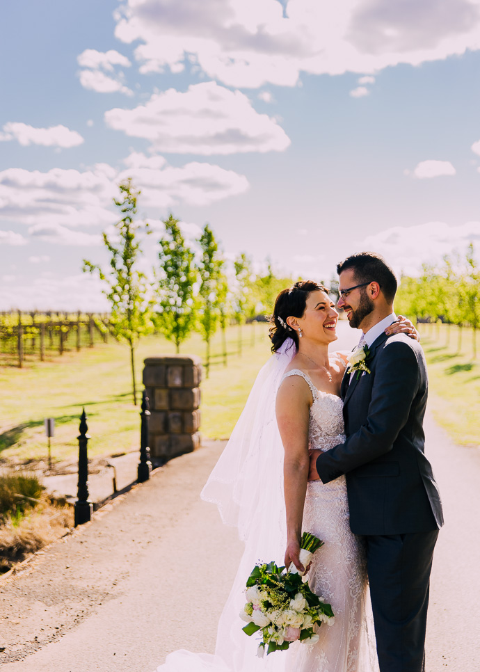 A bride and groom at a winery wedding at Witchmount Estate