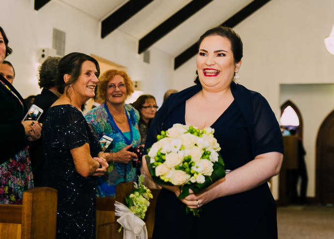 A bridesmaid walking