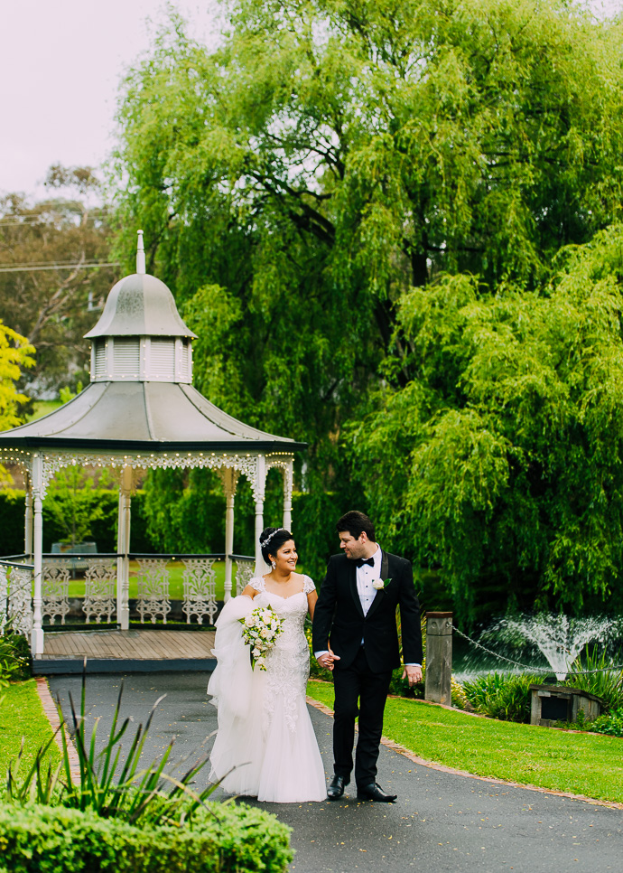 A bride a groom walking