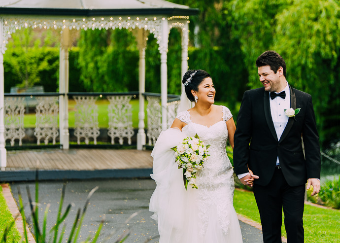 A bride a groom walking