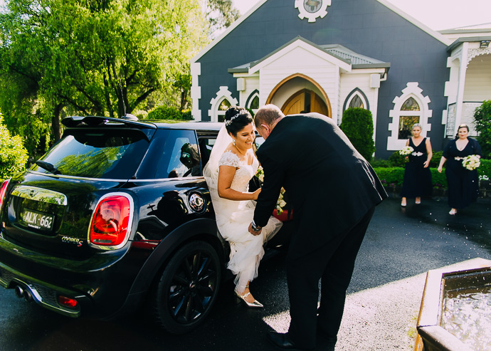 A bride getting out of the car