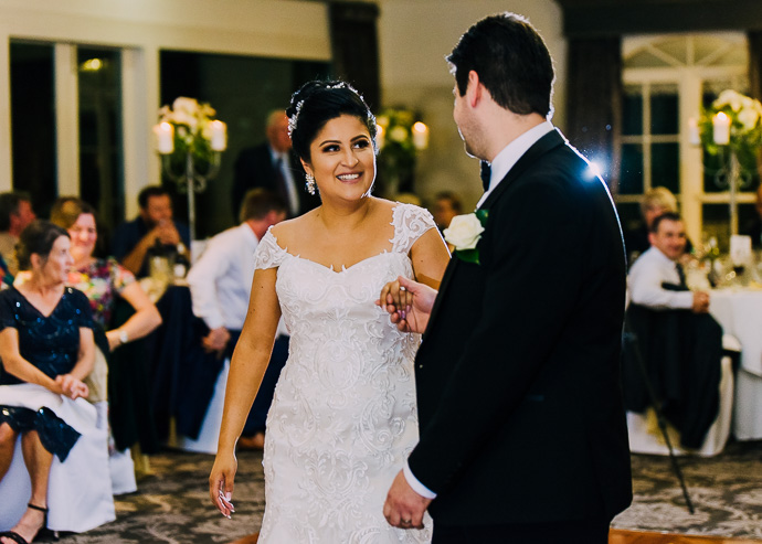 A bride and groom dancing