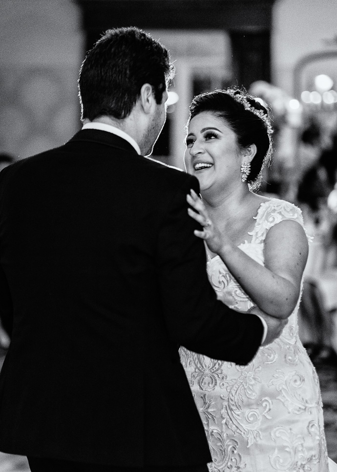 A bride and groom dancing