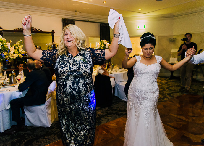 A bride and groom dancing