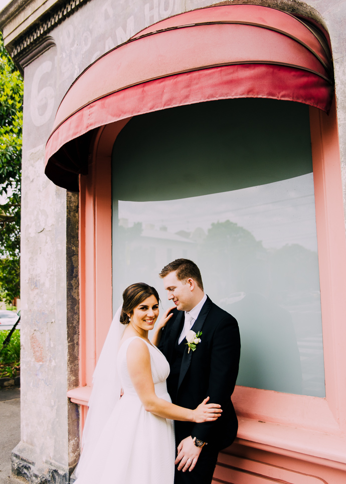 A bride and groom on their wedding day near South Melbourne Town Hall