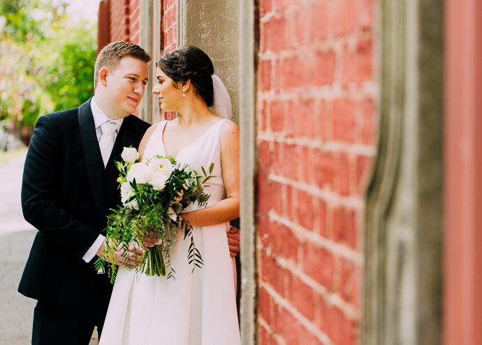 A bride and groom on their wedding day near South Melbourne Town Hall