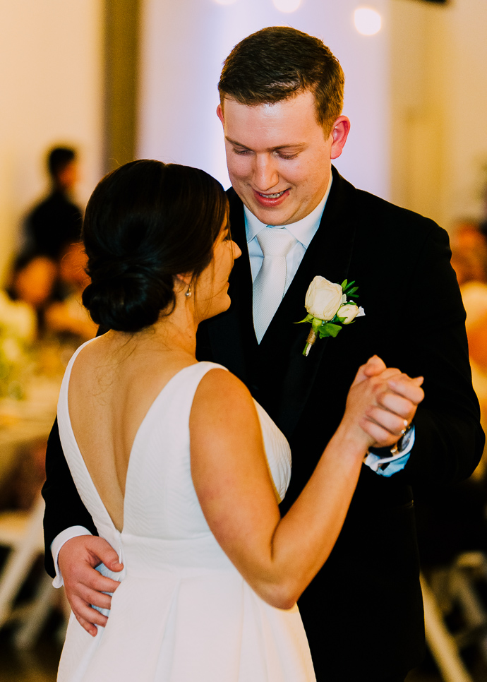 A bride and groom dancing at the wedding reception at Two Ton Max