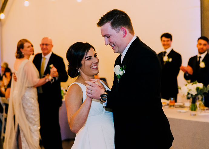 A bride and groom dancing at the wedding reception at Two Ton Max