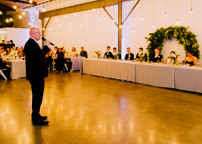 A Guest making a speech at a wedding