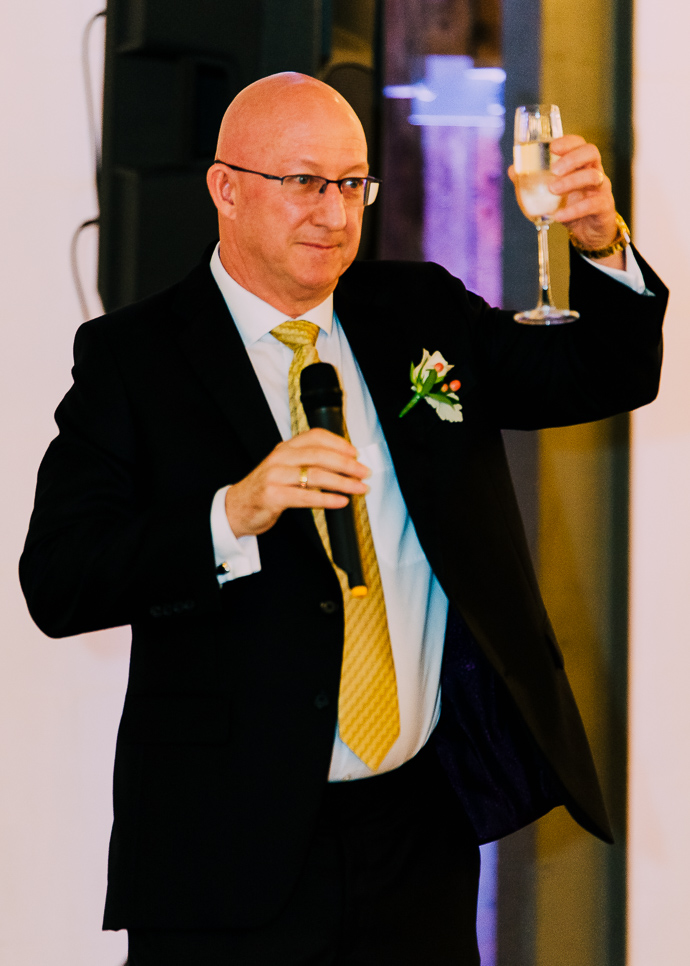 A Guest making a speech at a wedding