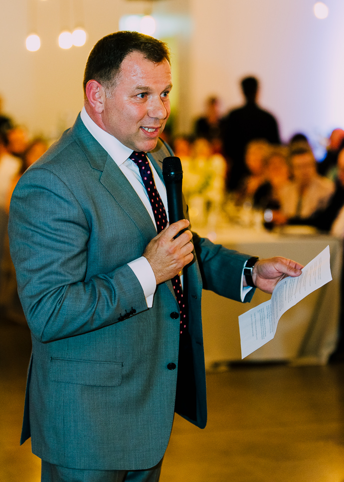 A Guest making a speech at a wedding