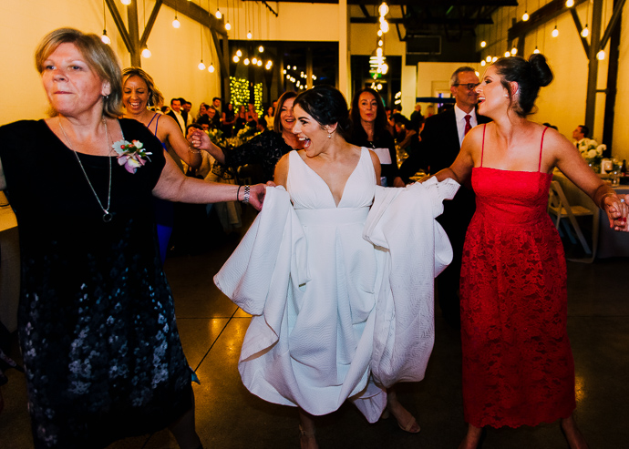 A bride dancing at a wedding