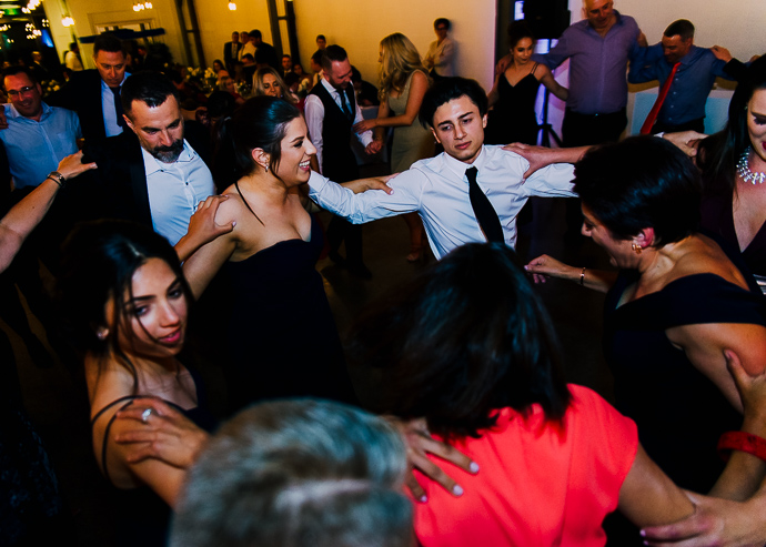 People dancing at a greek wedding