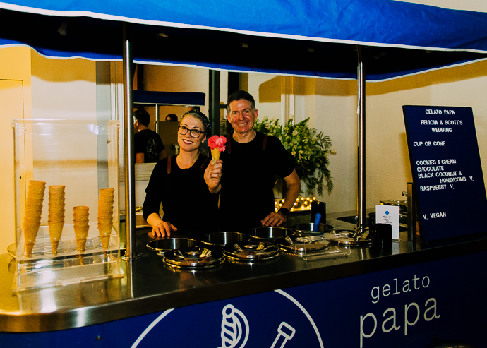 Two people in a gelati cart at a wedding
