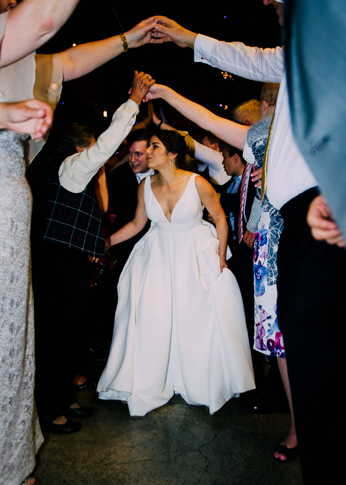 A bride leaving a wedding reception