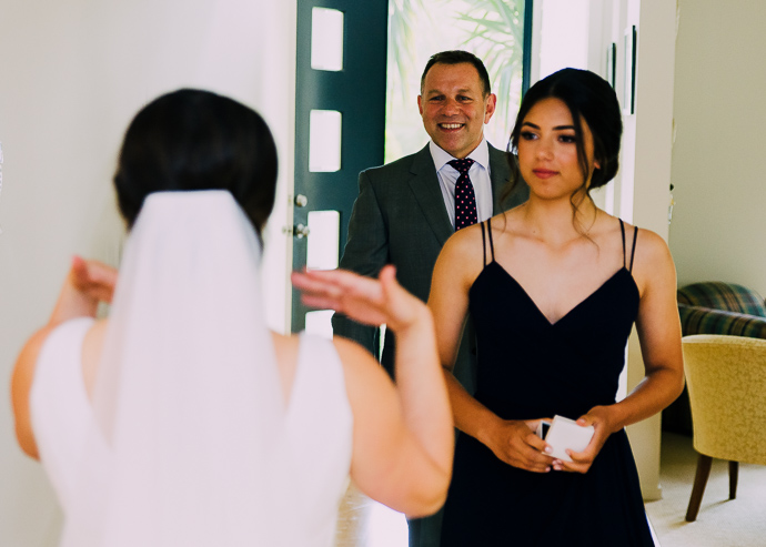 A bride and a bridesmaid