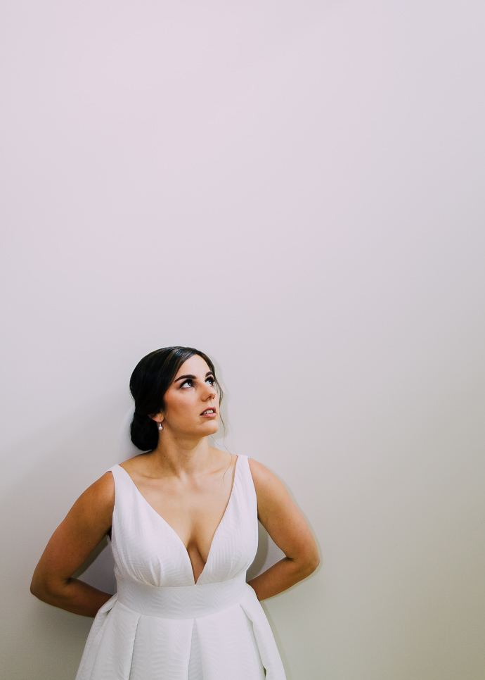 A bride looking up at the light