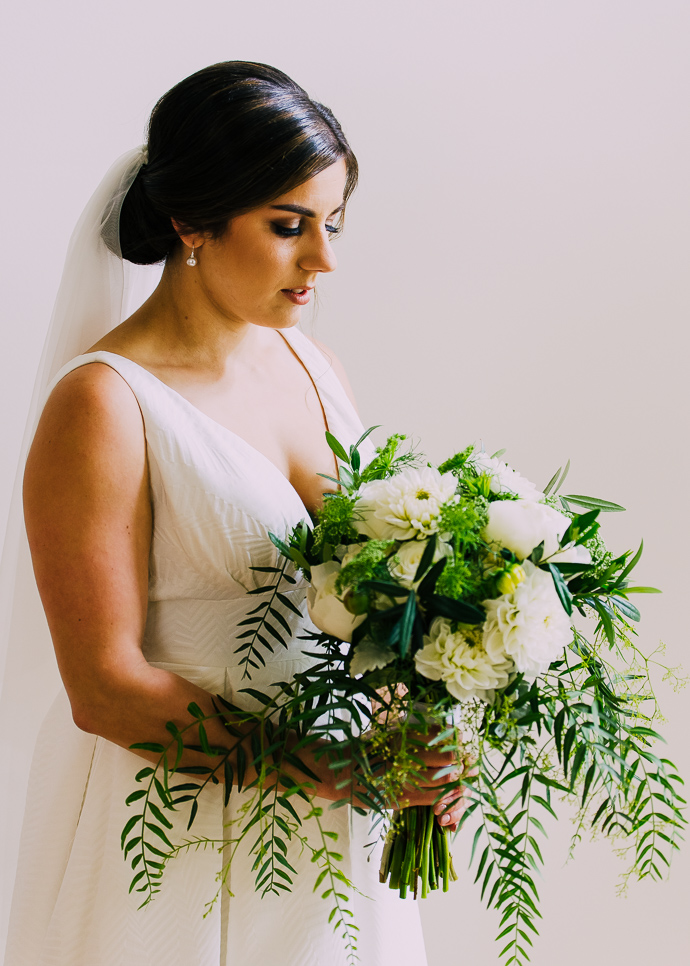 A bride holding flowers