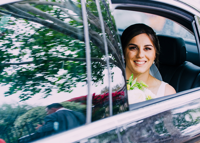 A bride in her wedding car
