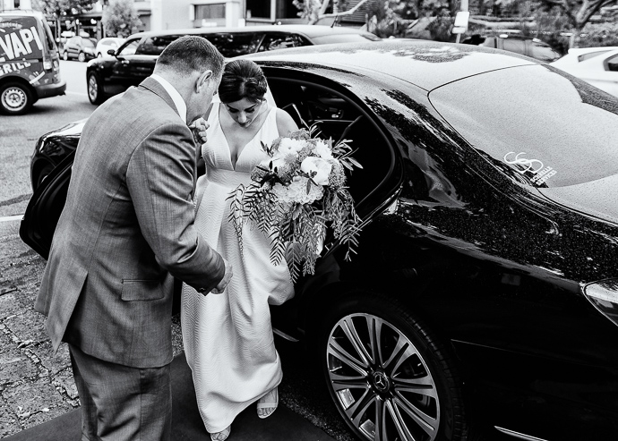 A bride getting out of the car